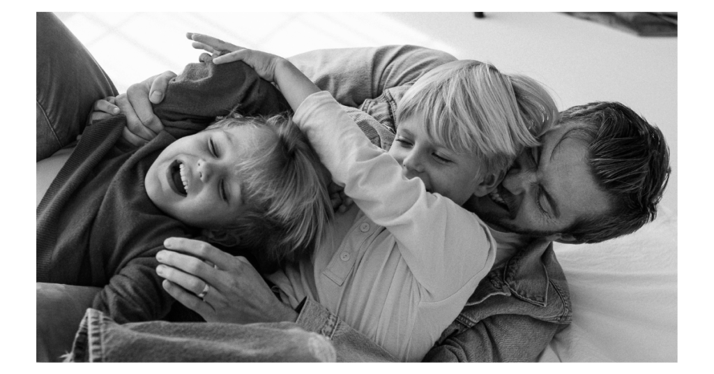 Parents and kids in seasonally appropriate outfits for Fort Worth family photography, relaxed and natural.